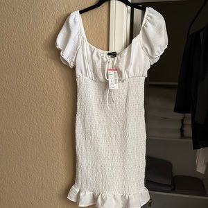 Cute, white sun dress. Tags still on, never been worn